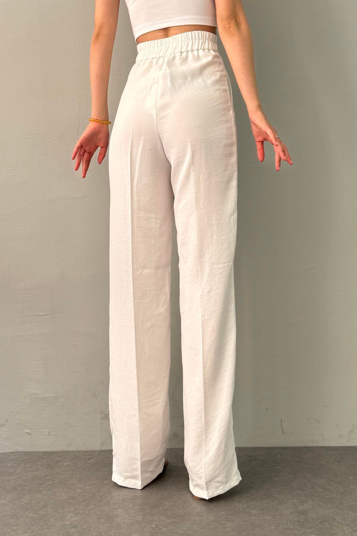 BEL ARKA LASTİK DETAYLI PANTOLON