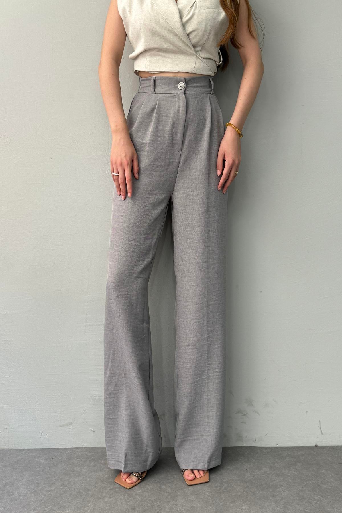 BEL ARKA LASTİK DETAYLI PANTOLON