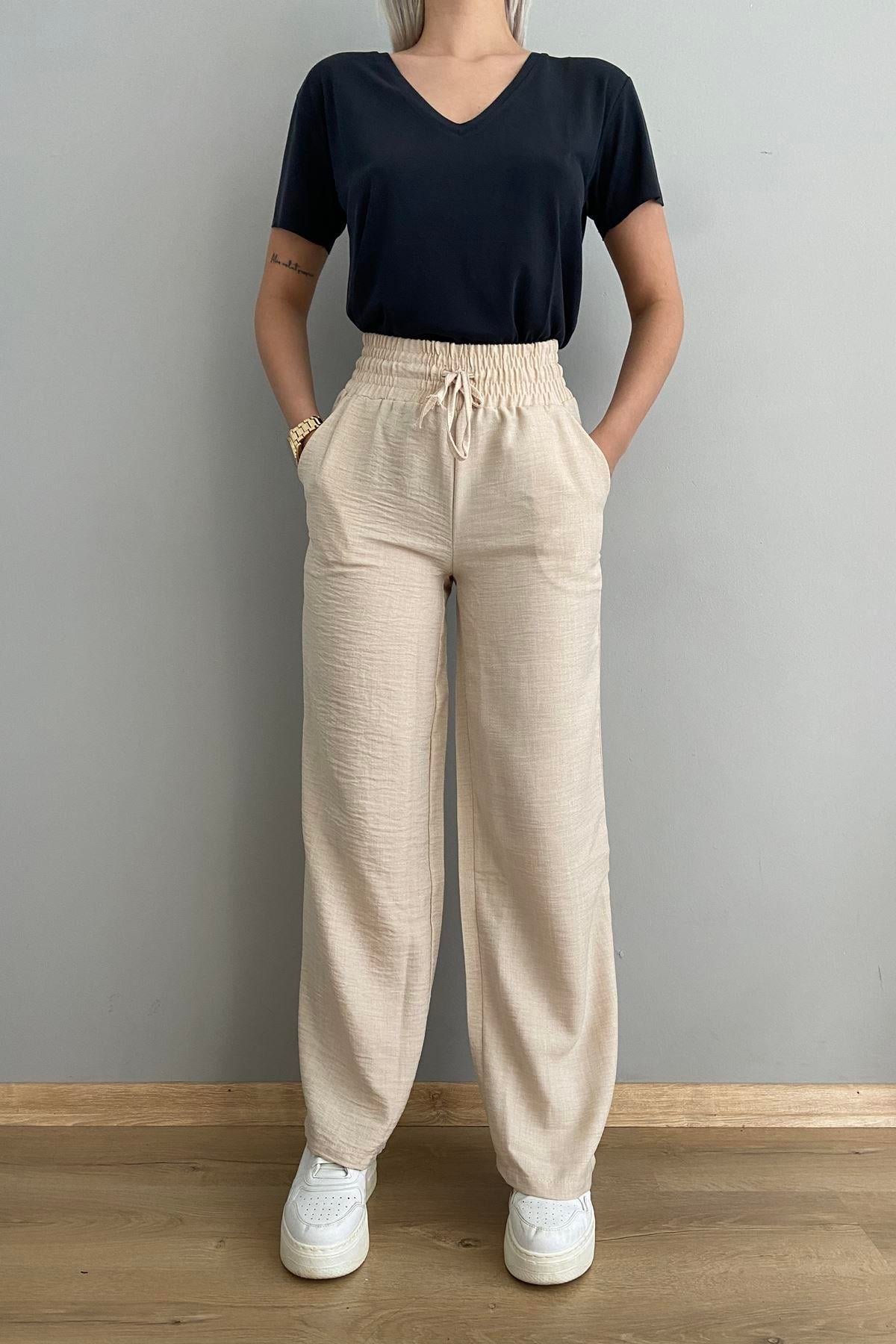 BEL LASTİKLİ BOL PAÇA PANTOLON