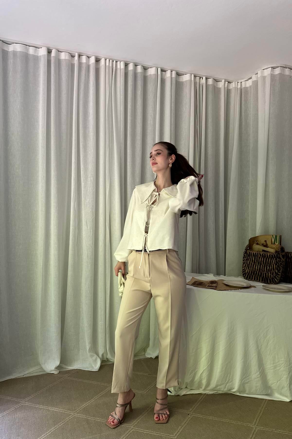 PAÇA YIRTMAÇLI KEMERLİ PANTALON