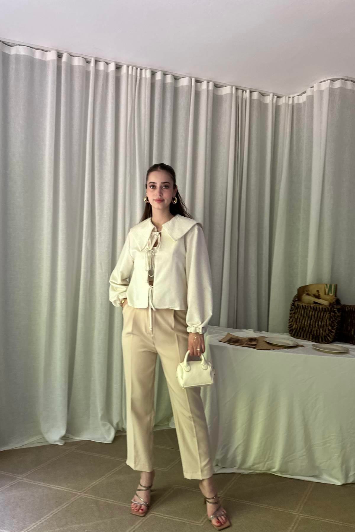 PAÇA YIRTMAÇLI KEMERLİ PANTALON