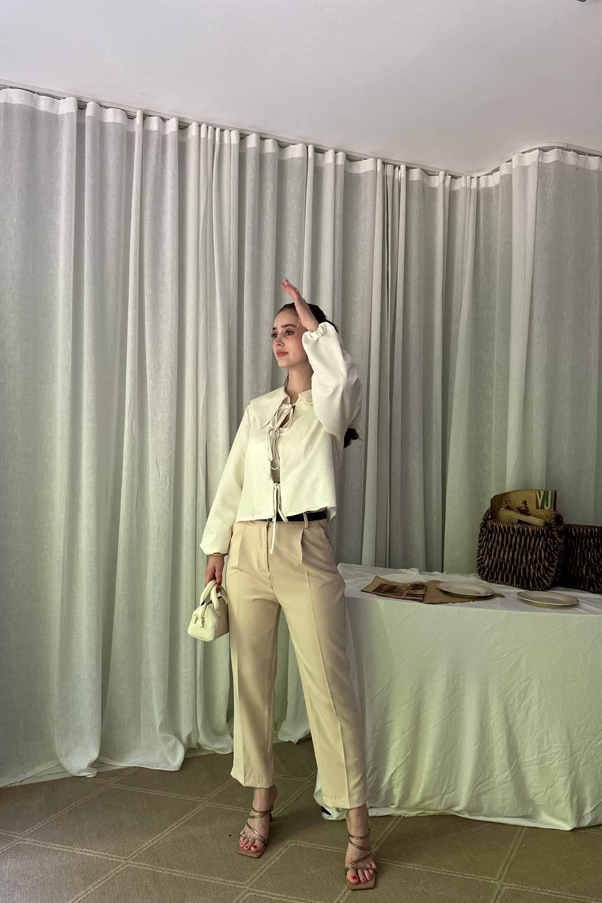 PAÇA YIRTMAÇLI KEMERLİ PANTALON