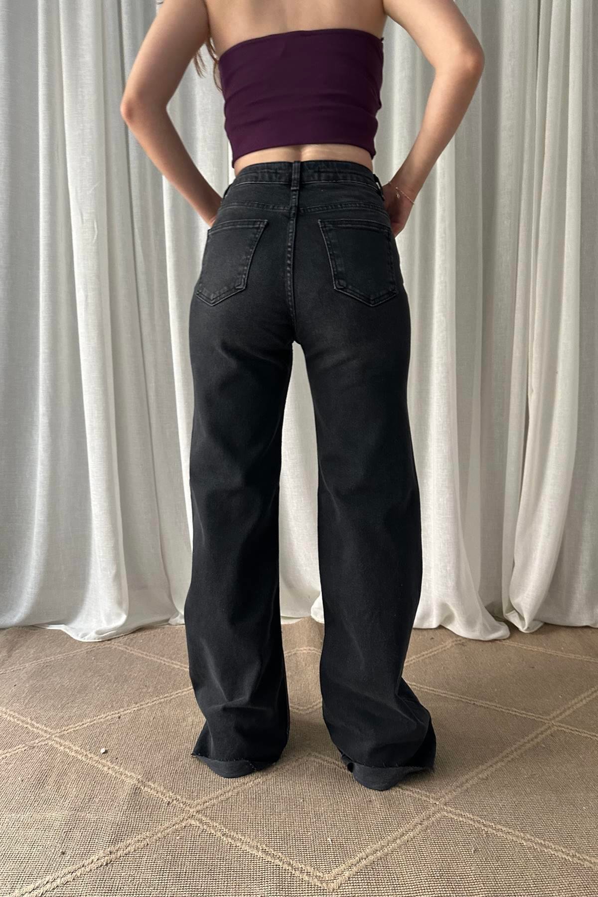 PAÇASI DİKİŞSİZ LİKRALI GENİŞ KOT PANTOLON