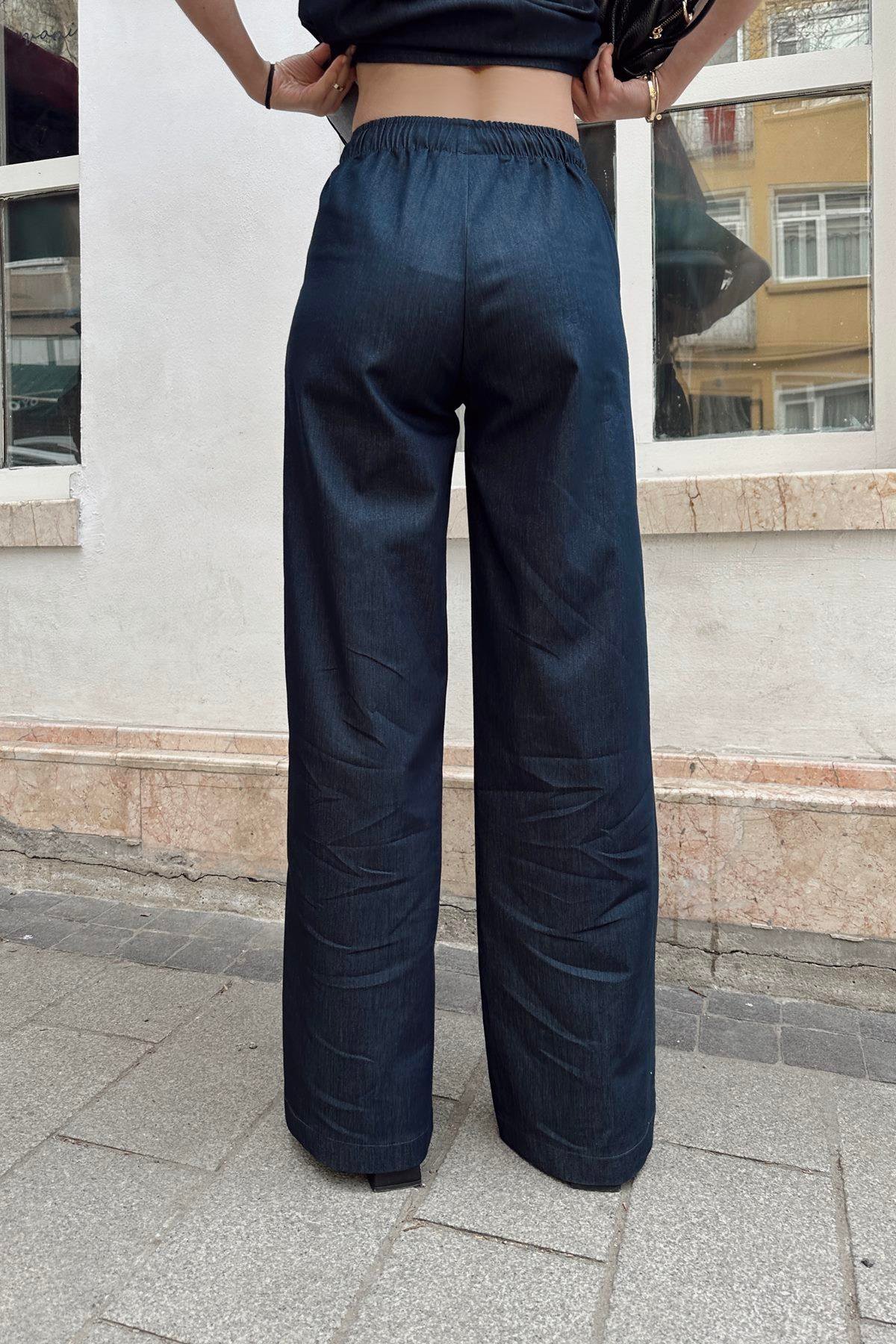 UZUN DÖKÜMLÜ ŞIK PANTOLON