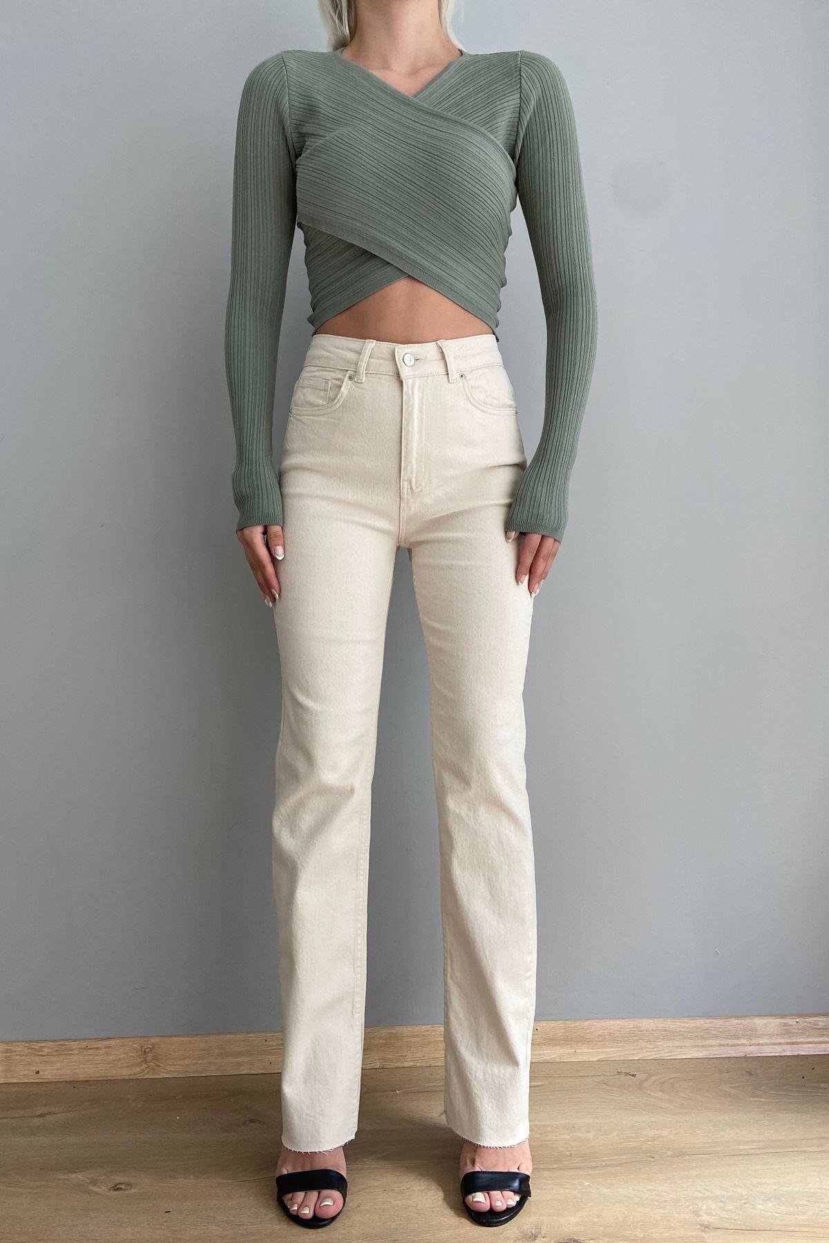 YANI KESİK LİKRALI FLARE PANTOLON