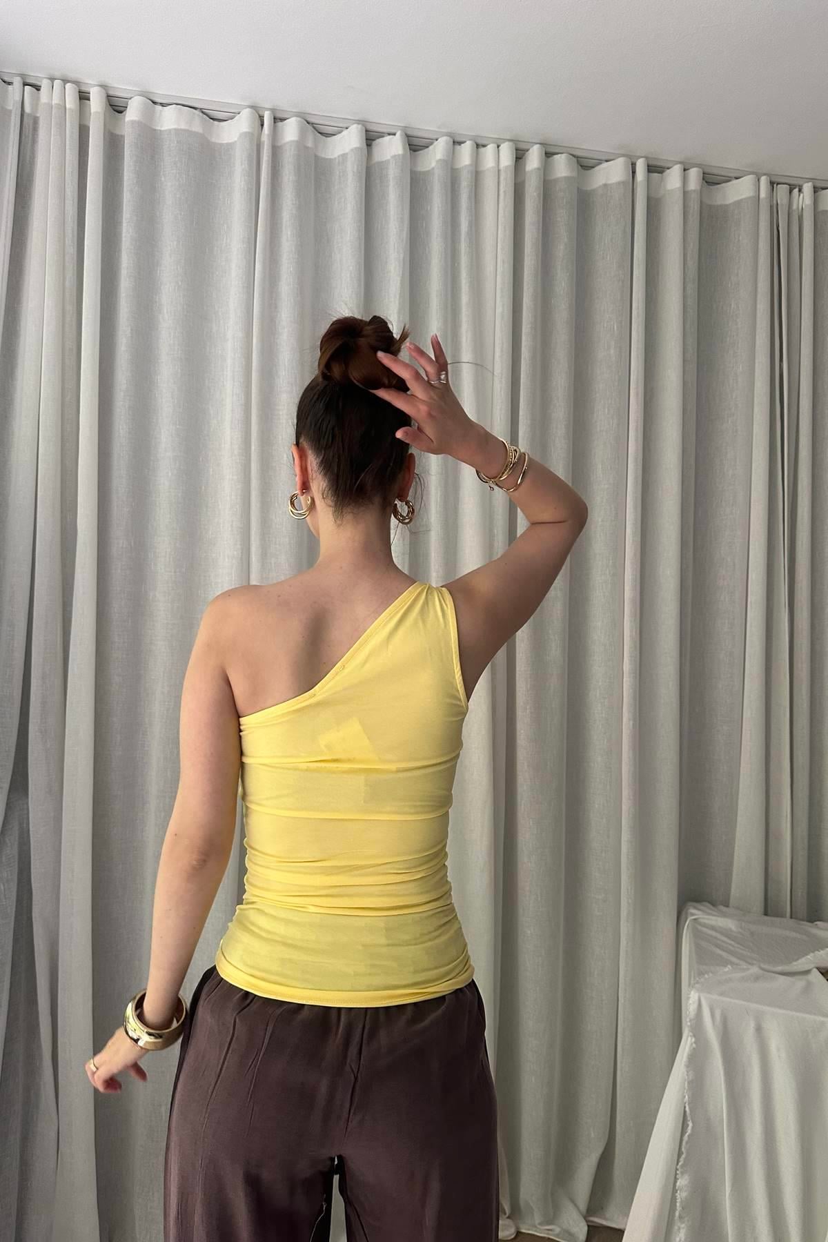 DÜĞÜM DETAYLI ASİMETRİK TOP
