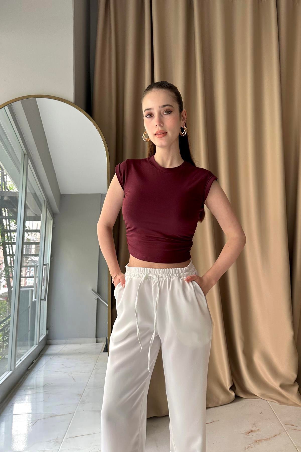 YANLARI BÜZGÜ DETAYLI TOP