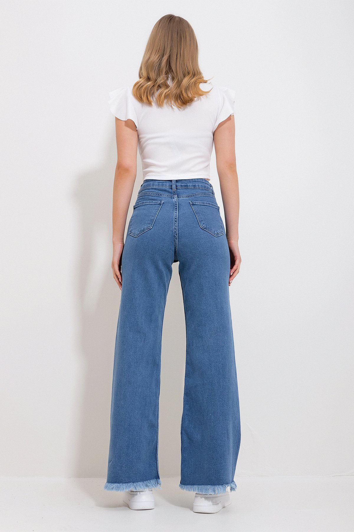 Beş Cepli Likralı Paçası Püsküllü Palazzo Denim Pantolon - Açık Mavi