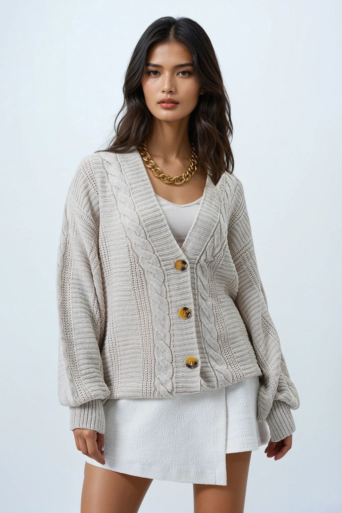 V YAKA SAÇ ÖRGÜ DESENLİ BALON KOL TRİKO HIRKA - BEJ