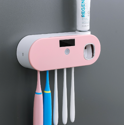 Kolay diş macunu sıkacağıyla akıllı UV diş fırçası tutucusu