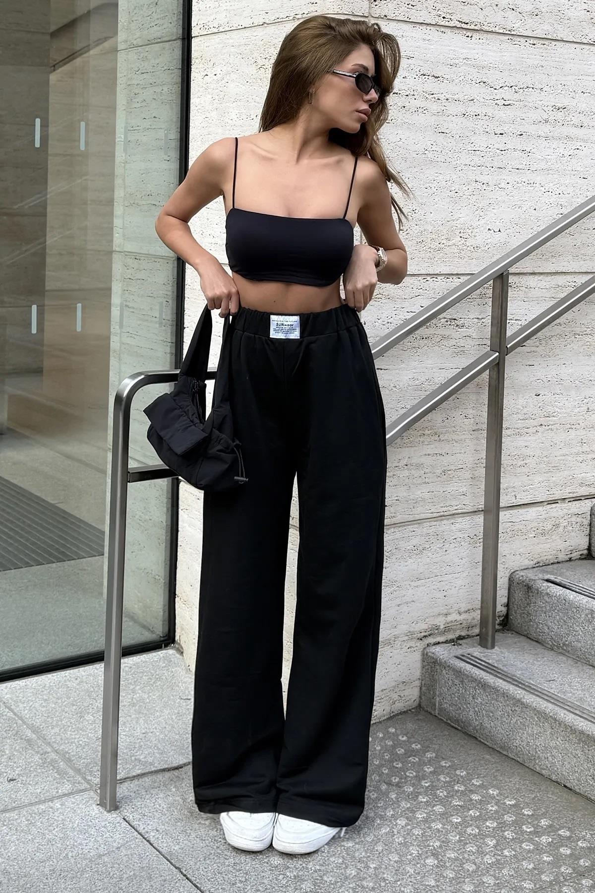 Kadın Siyah Sunwear Etiketli Bol Paça Palazzo EşofmanSun VictoriaKadın Siyah Sunwear Etiketli Bol Paça Palazzo Eşofman