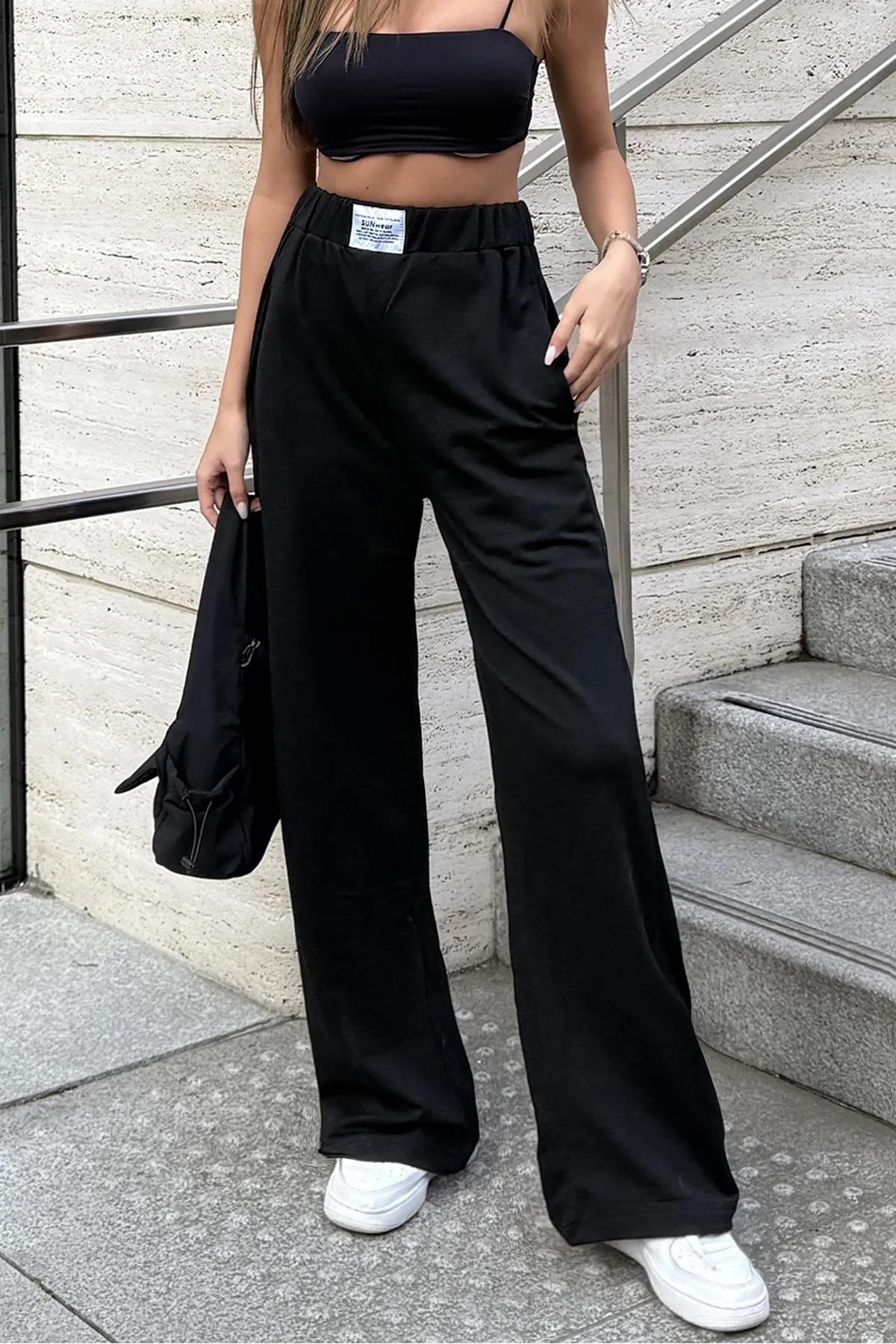 Kadın Siyah Sunwear Etiketli Bol Paça Palazzo EşofmanSun VictoriaKadın Siyah Sunwear Etiketli Bol Paça Palazzo Eşofman