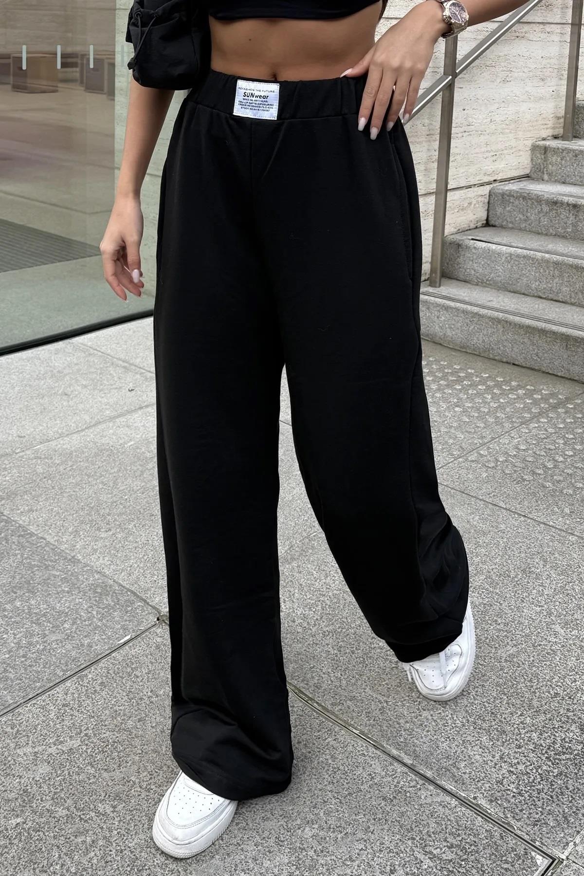 Kadın Siyah Sunwear Etiketli Bol Paça Palazzo EşofmanSun VictoriaKadın Siyah Sunwear Etiketli Bol Paça Palazzo Eşofman