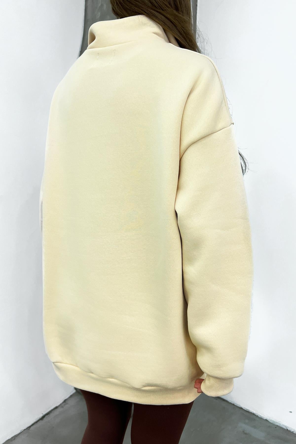 Krem Oakland Baskılı Fermuarlı SweatSun VictoriaKrem Oakland Baskılı Fermuarlı Sweat