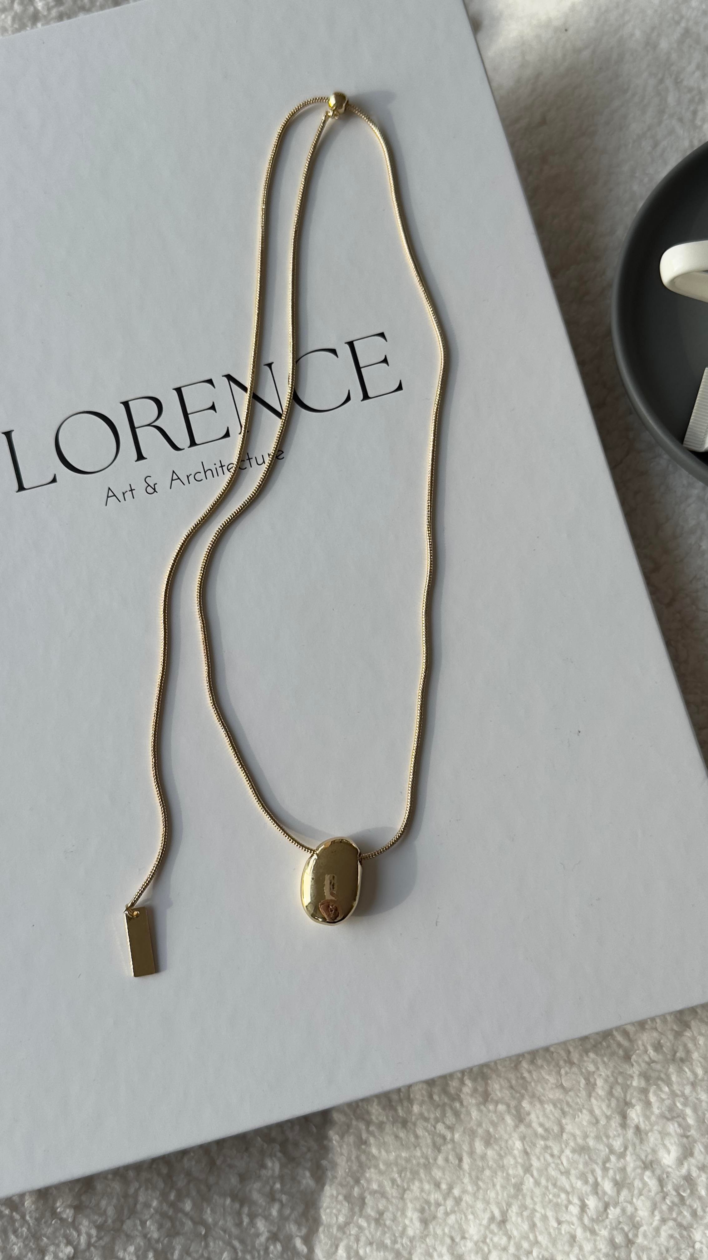 Gold Asansörlü Asimetrik Oval Detaylı Kolye