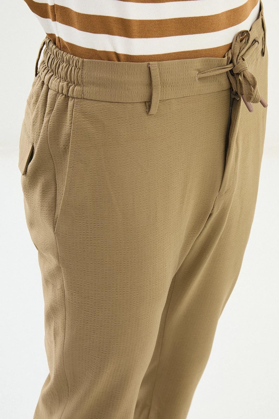 Gofreli Super Slim Fit Beli Lastikli İpli Erkek Pantolon ürünü ALT GİYİM kategorisinde sizleri bekliyor.