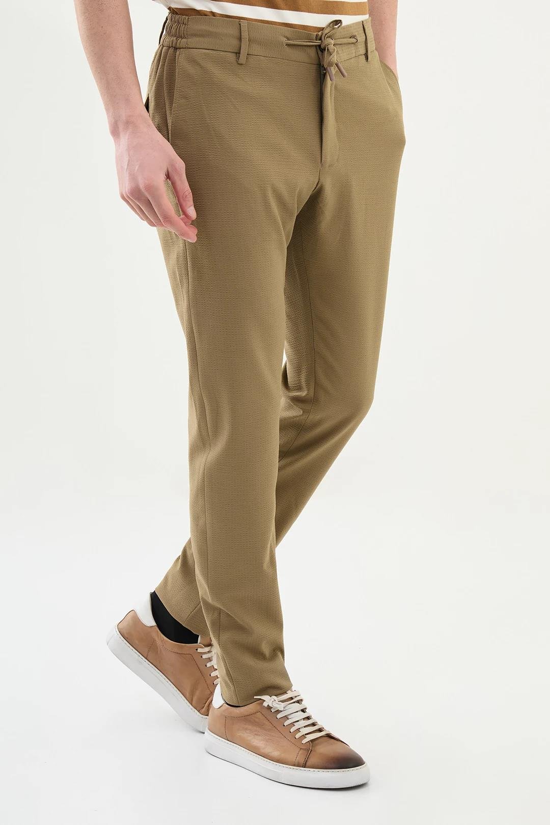 Gofreli Super Slim Fit Beli Lastikli İpli Erkek Pantolon ürünü ALT GİYİM kategorisinde sizleri bekliyor.