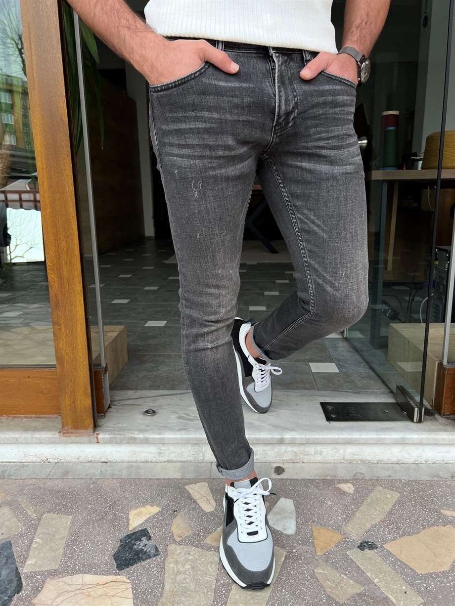 Taşlamalı Slim Fit Kot Pantolon ürünü JEANS CLOTHING kategorisinde sizleri bekliyor.
