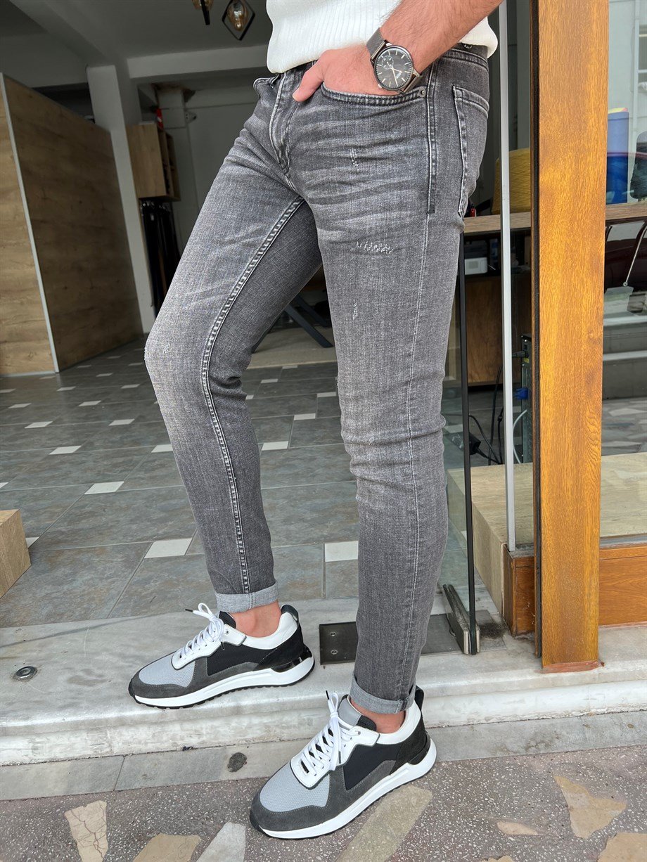 Taşlamalı Slim Fit Kot Pantolon ürünü JEANS CLOTHING kategorisinde sizleri bekliyor.