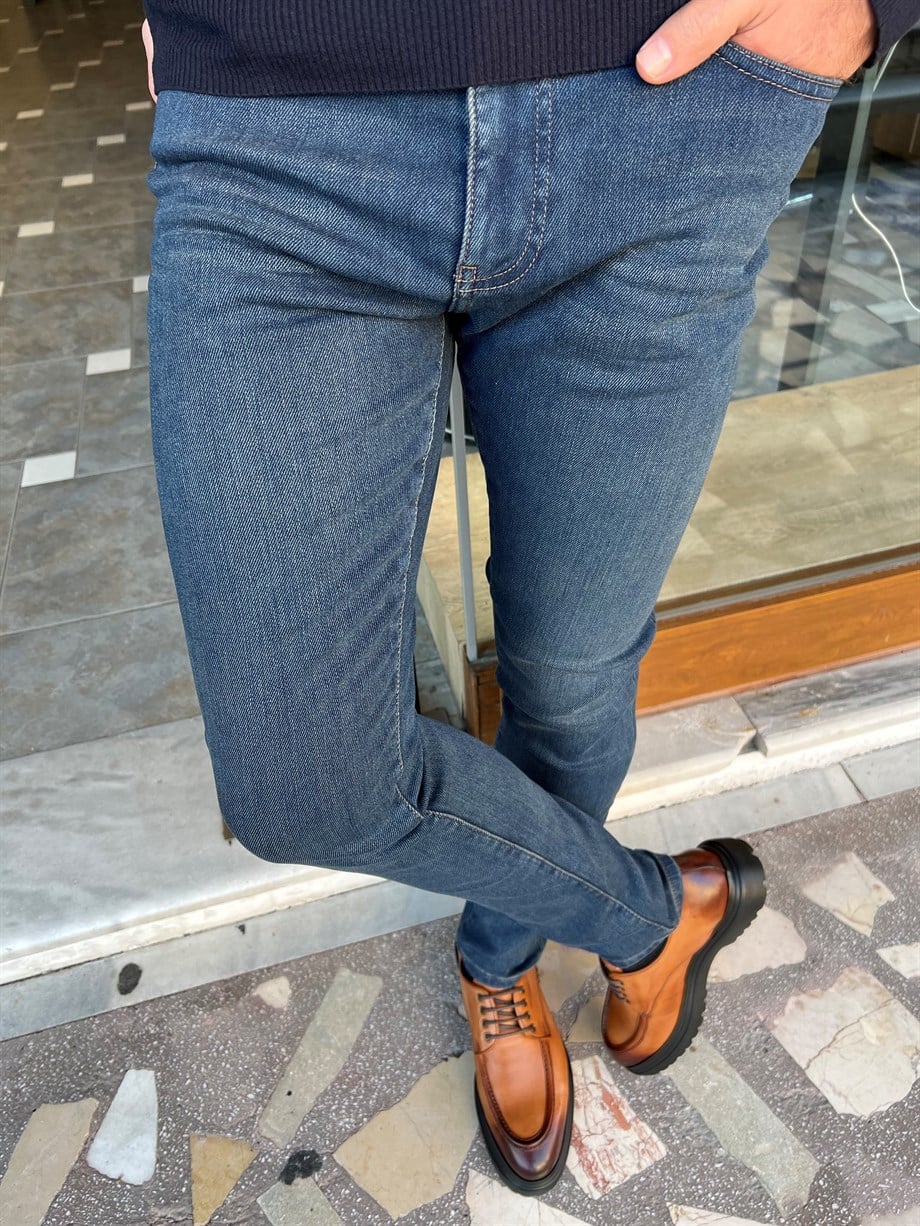 Taşlamalı Yan Cepli Slim Fit Kot Pantolon ürünü ALT GİYİM kategorisinde sizleri bekliyor.