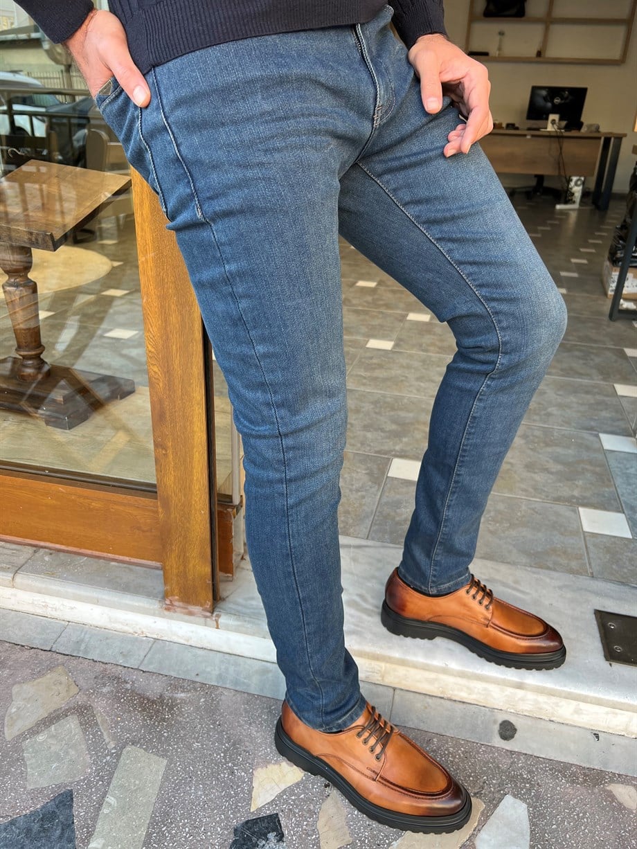 Taşlamalı Yan Cepli Slim Fit Kot Pantolon ürünü ALT GİYİM kategorisinde sizleri bekliyor.