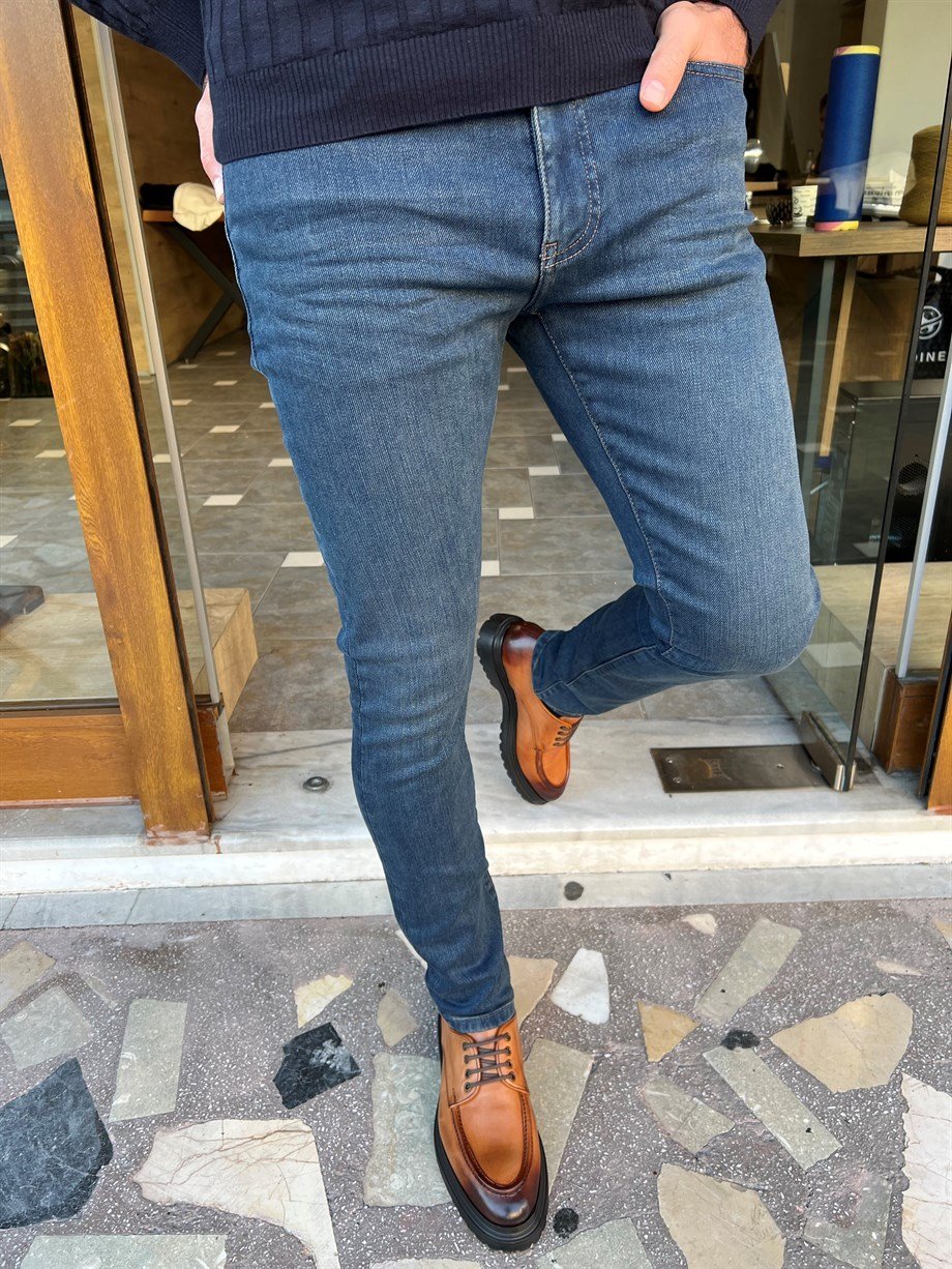 Taşlamalı Yan Cepli Slim Fit Kot Pantolon ürünü ALT GİYİM kategorisinde sizleri bekliyor.