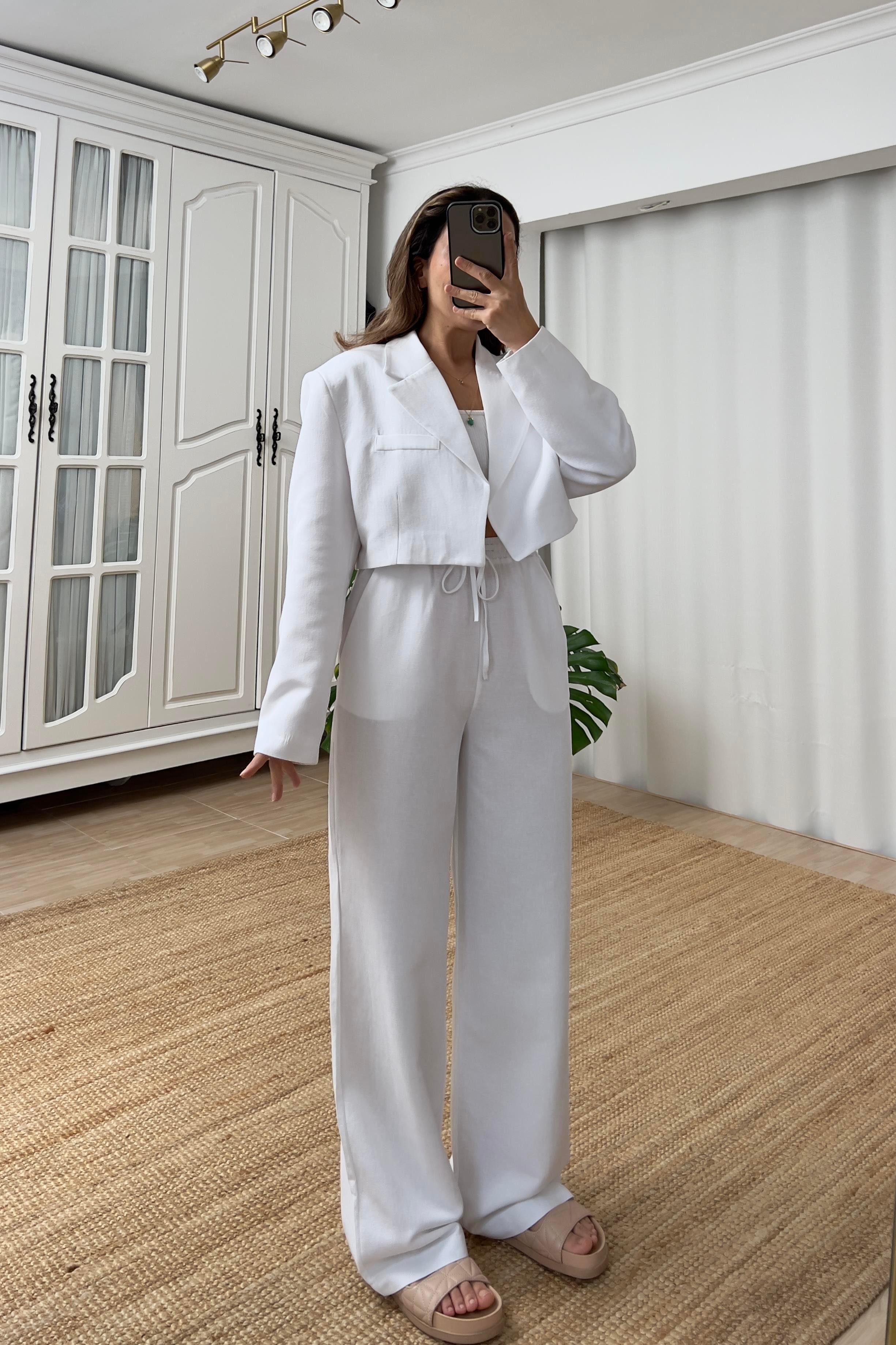 Beyaz Beli İpli Cepli Keten Pantolon uygun fiyatlarda www.butikhola.com adresinde