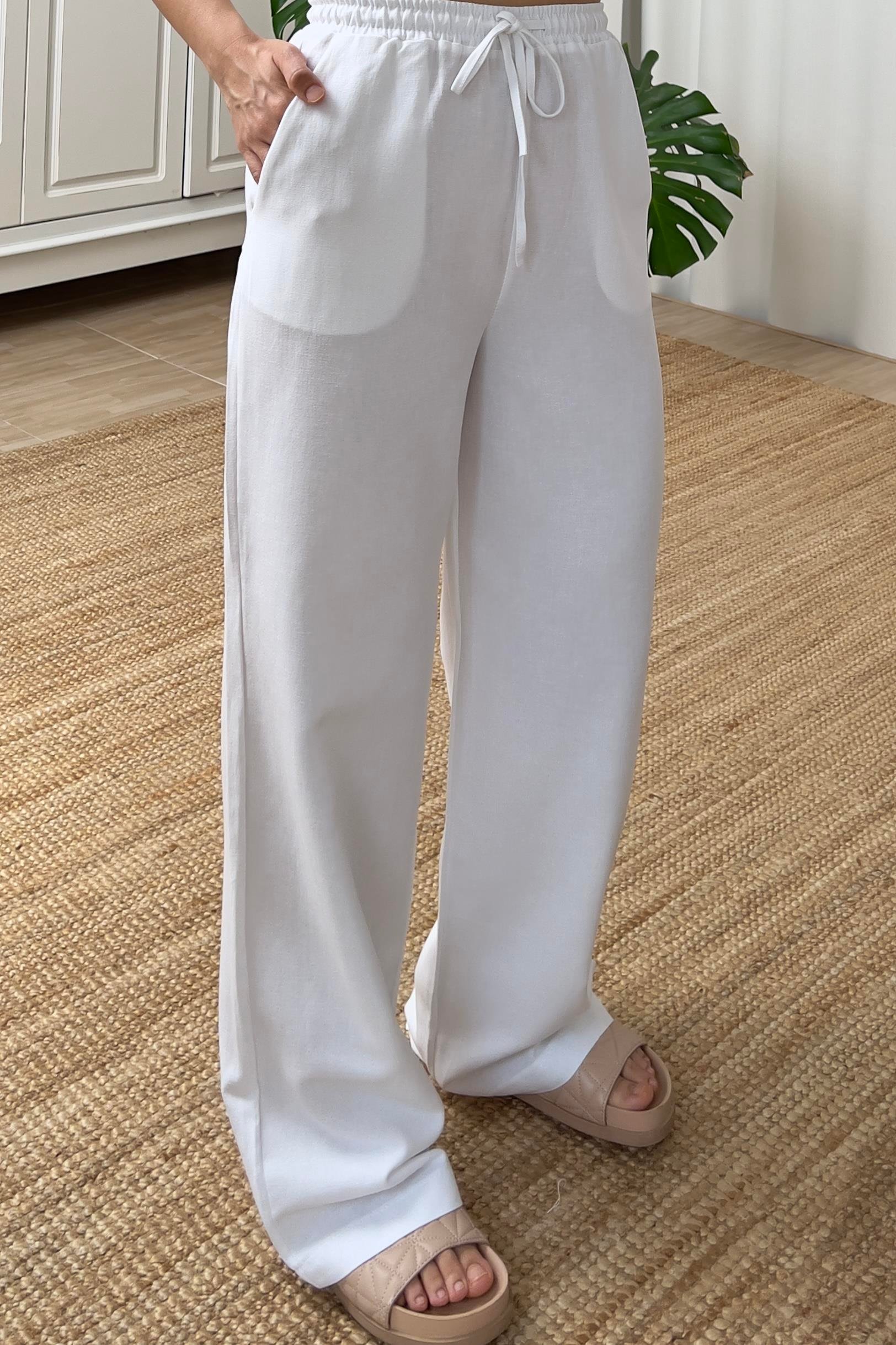 Beyaz Beli İpli Cepli Keten Pantolon uygun fiyatlarda www.butikhola.com adresinde