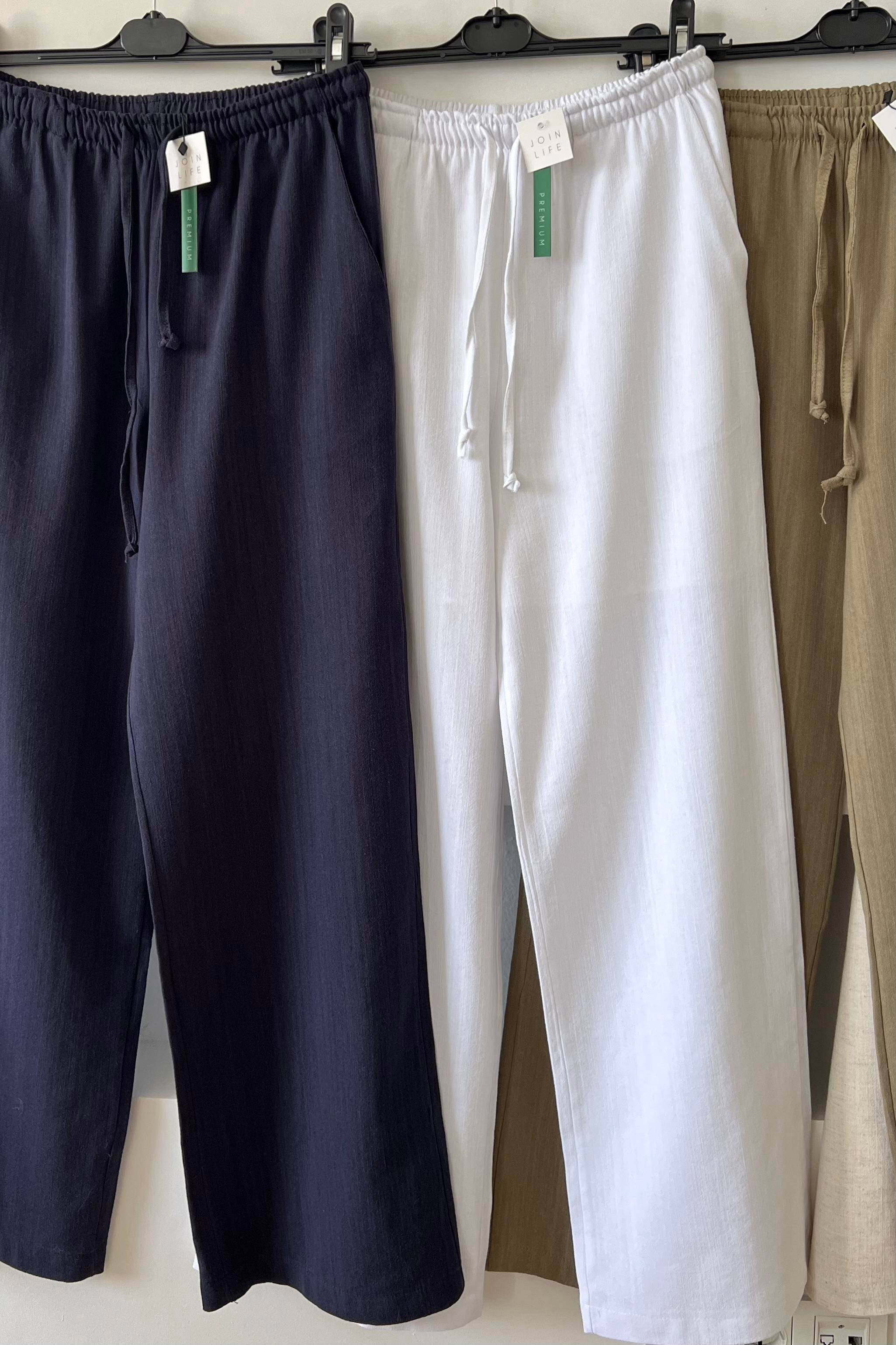 Beyaz Düz Kesim Keten Pantolon uygun fiyatlarda www.butikhola.com adresinde