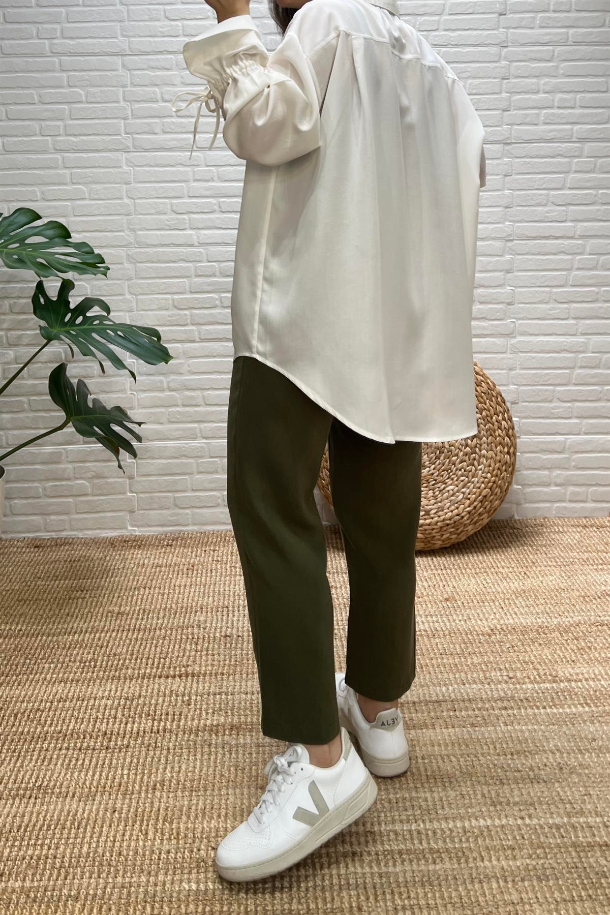 Beyaz Kolu Bağlama Detaylı Tensel Gömlek uygun fiyatlarda www.butikhola.com adresinde