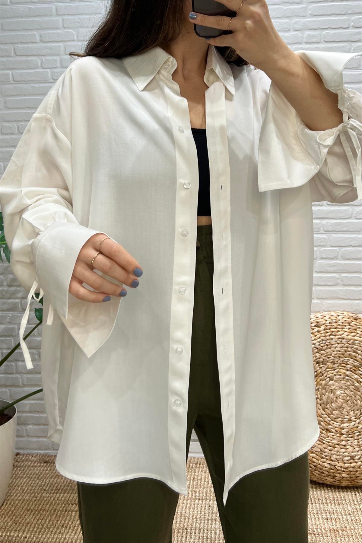 Beyaz Kolu Bağlama Detaylı Tensel Gömlek uygun fiyatlarda www.butikhola.com adresinde