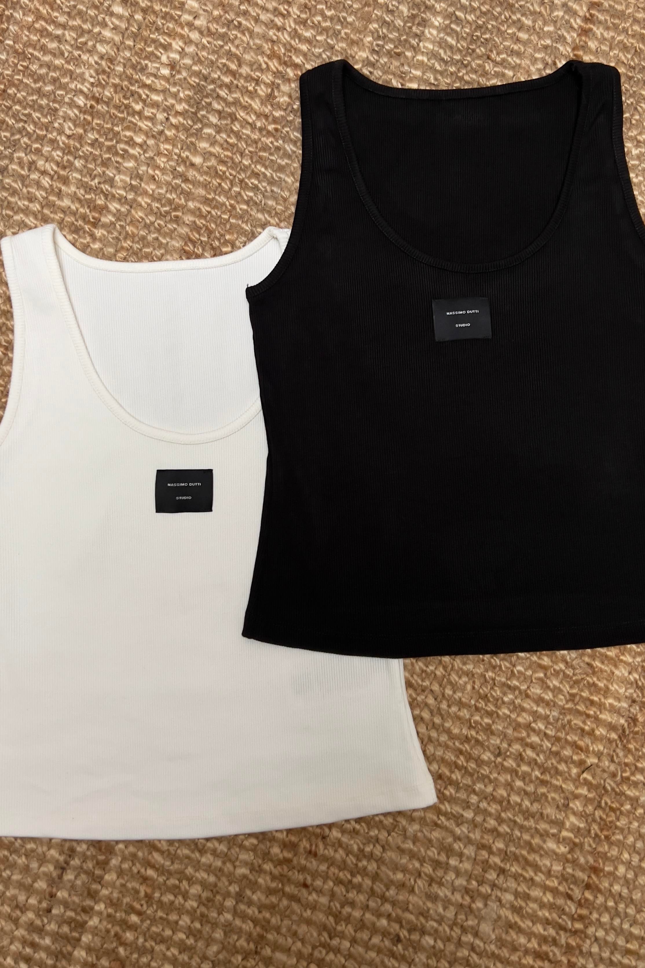 Beyaz MD Logolu Kolsuz Tshirt uygun fiyatlarda www.butikhola.com adresinde