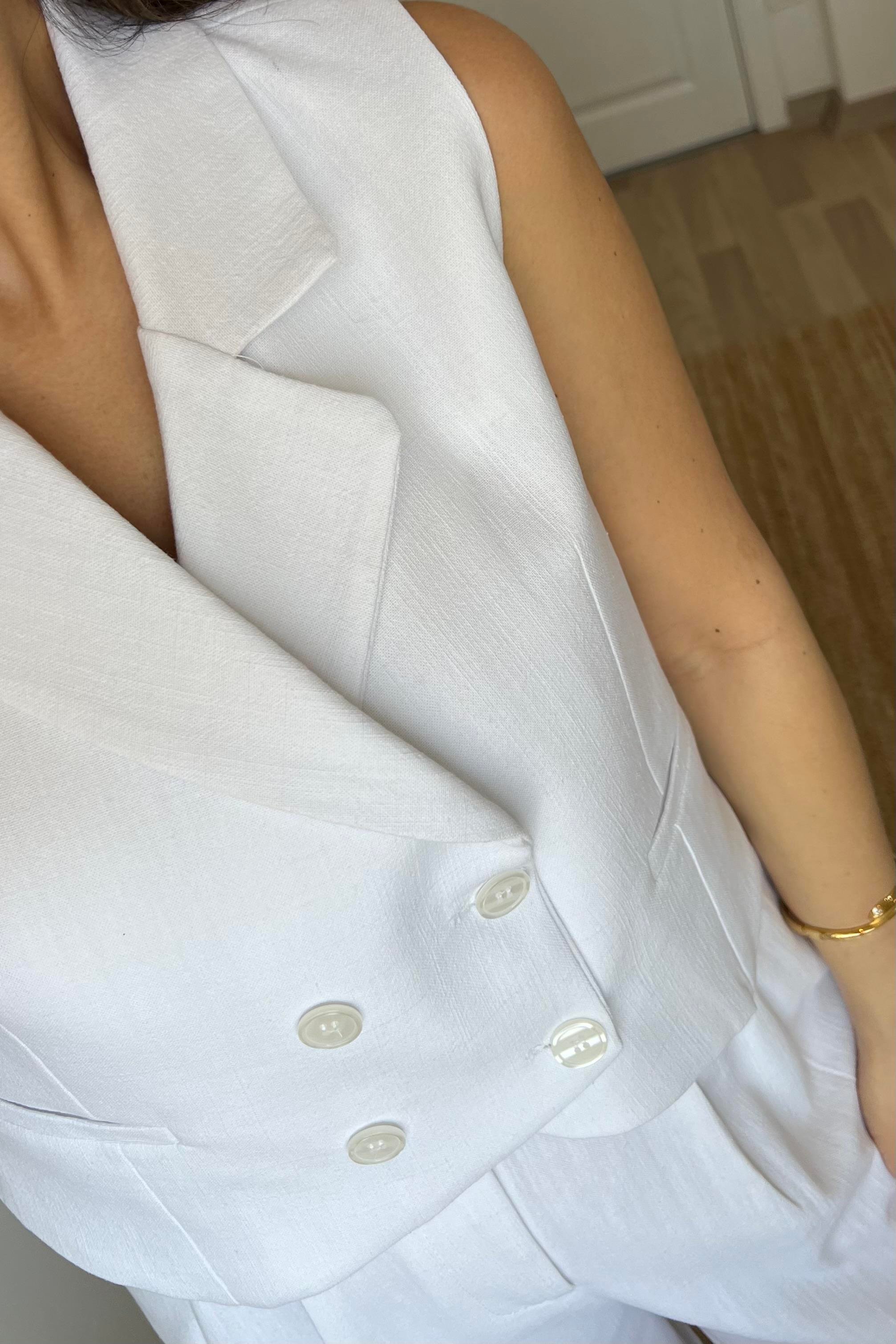 Beyaz Minimal Yelek Pantolon Takım uygun fiyatlarda www.butikhola.com adresinde
