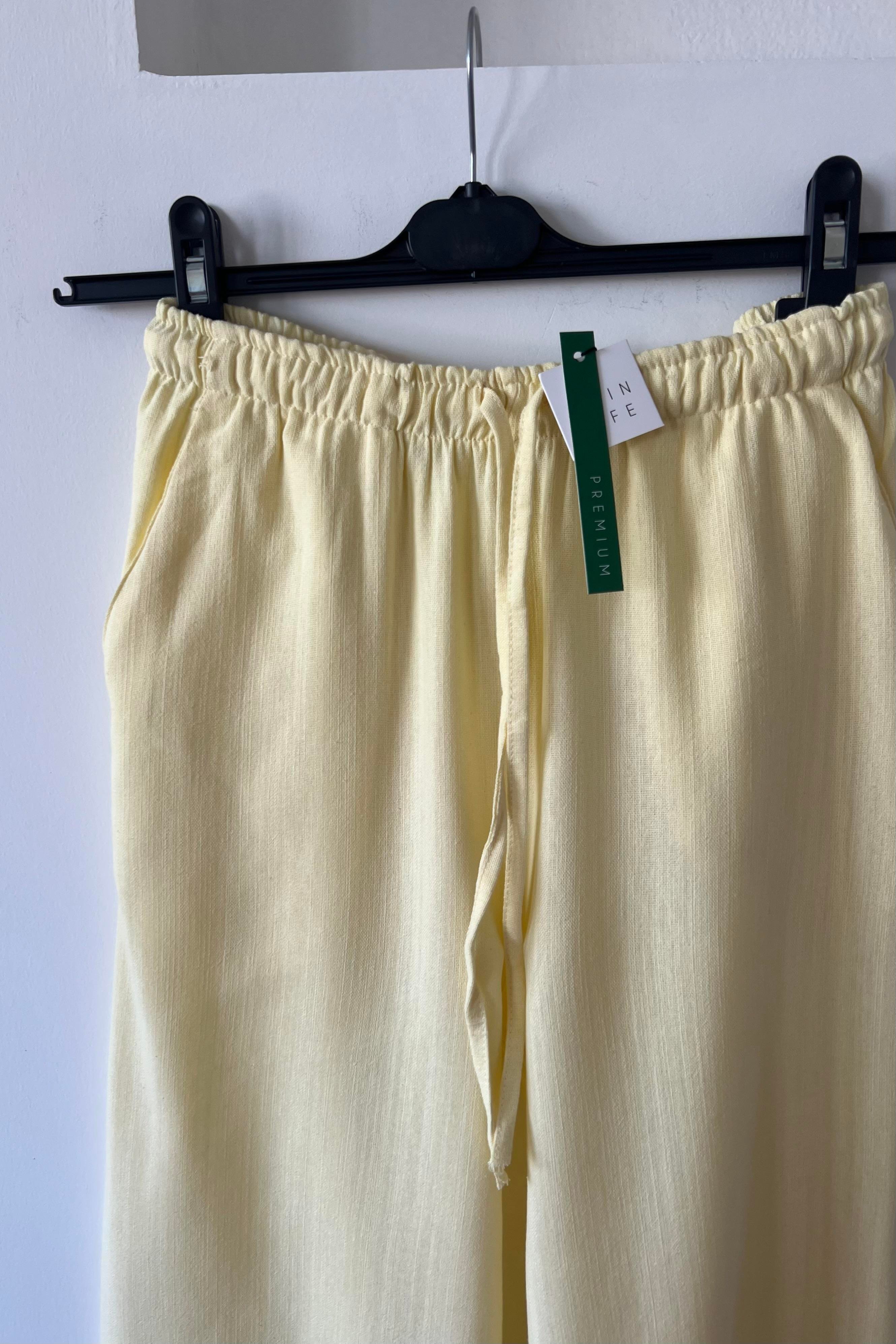 Sarı Düz Kesim Keten Pantolon uygun fiyatlarda www.butikhola.com adresinde