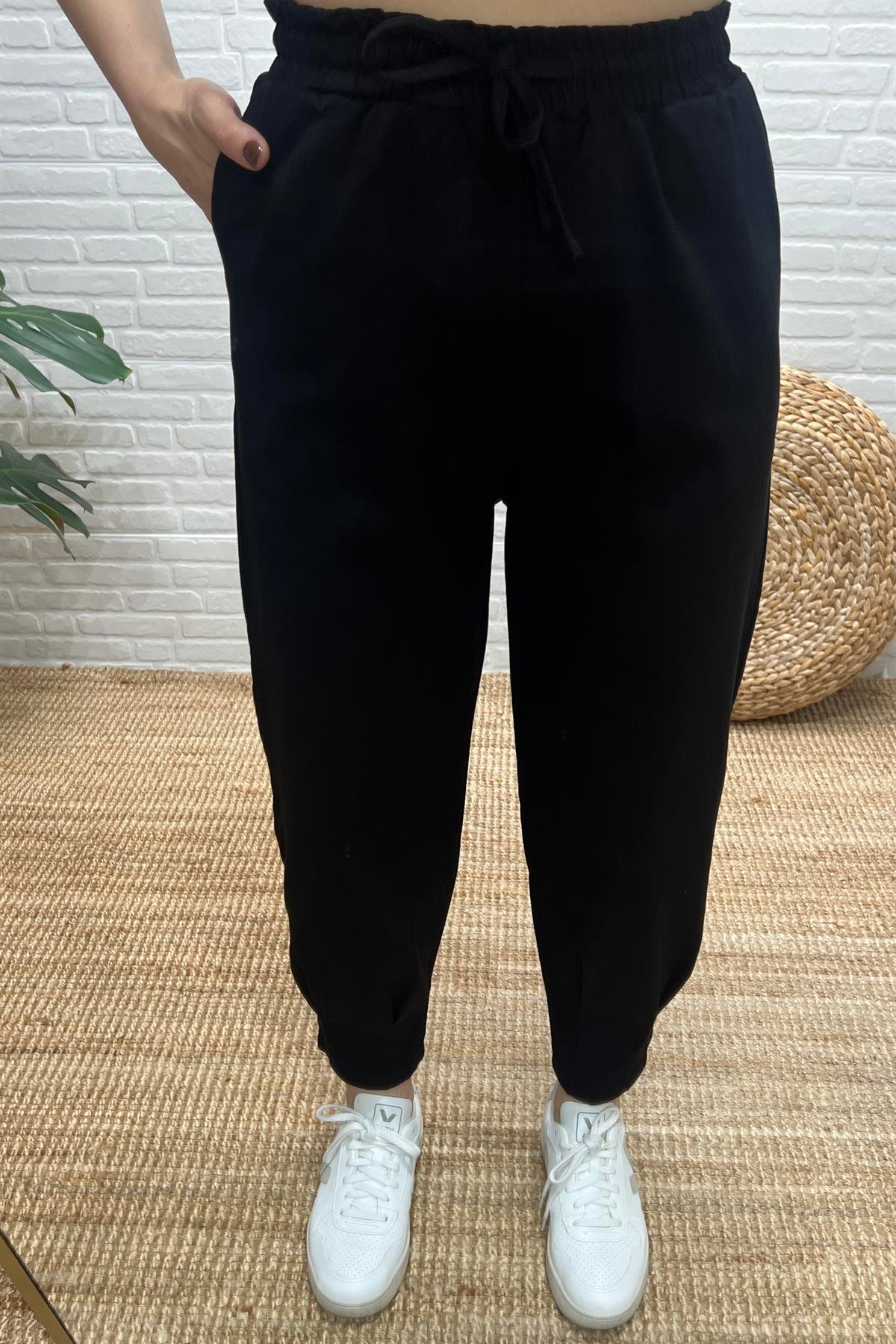 Siyah Beli Lastikli Paçası Pileli Gabardin Pantolon uygun fiyatlarda www.butikhola.com adresinde