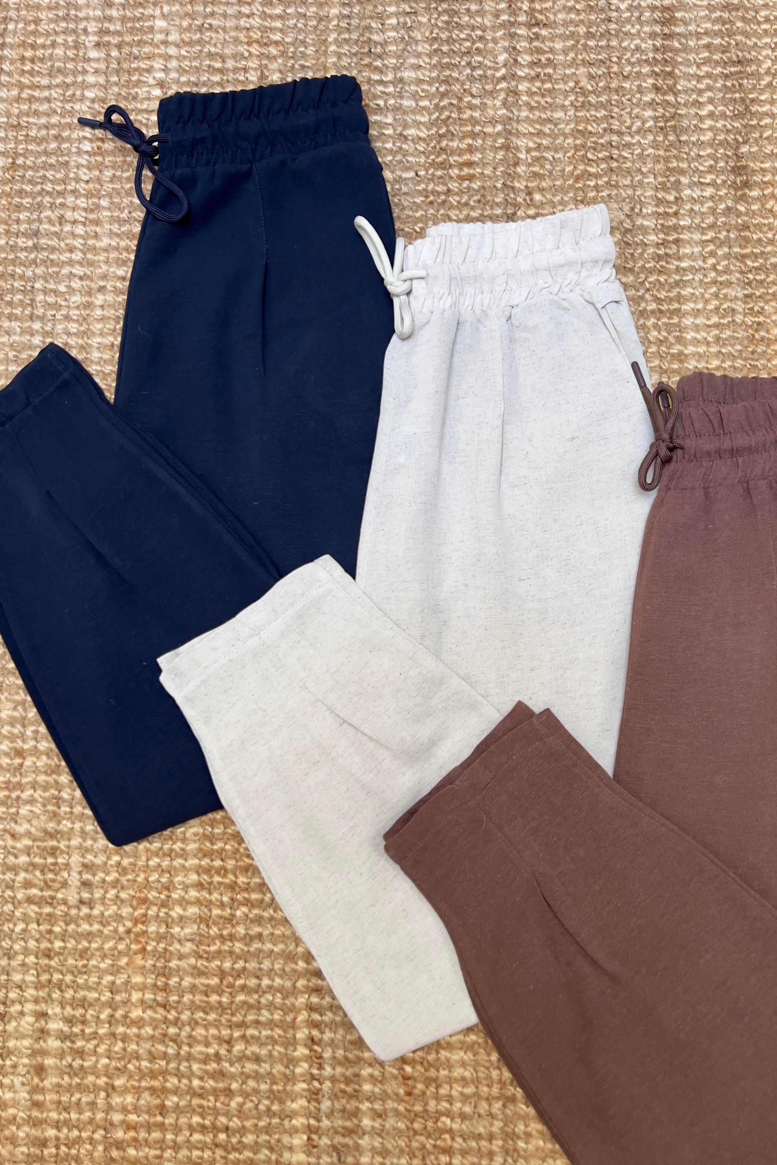 Taş Beli Lastikli Paçası Pileli Keten Pantolon uygun fiyatlarda www.butikhola.com adresinde