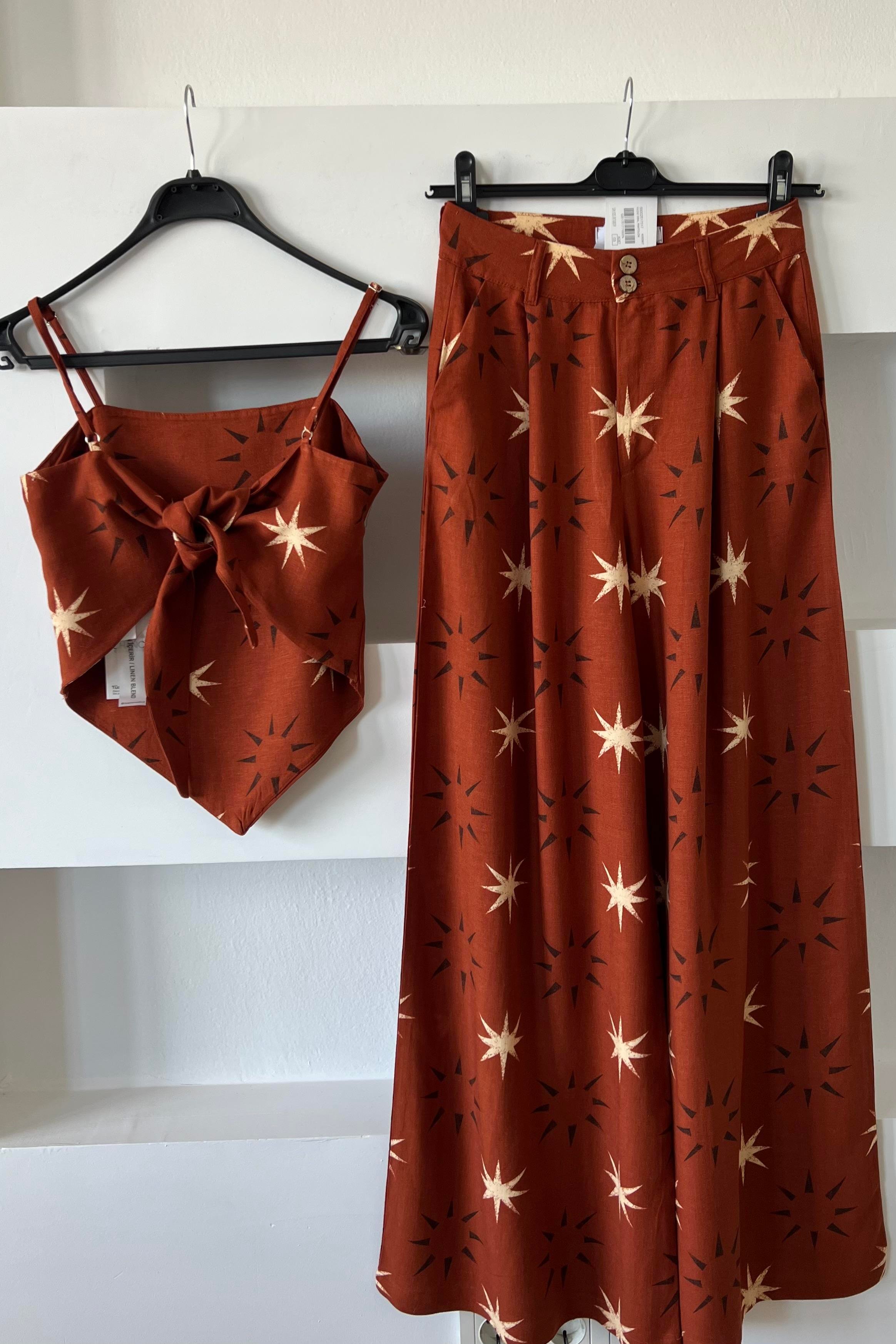 Yıldız Desenli Asimetrik Bluz ve Pantolon Takım uygun fiyatlarda www.butikhola.com adresinde