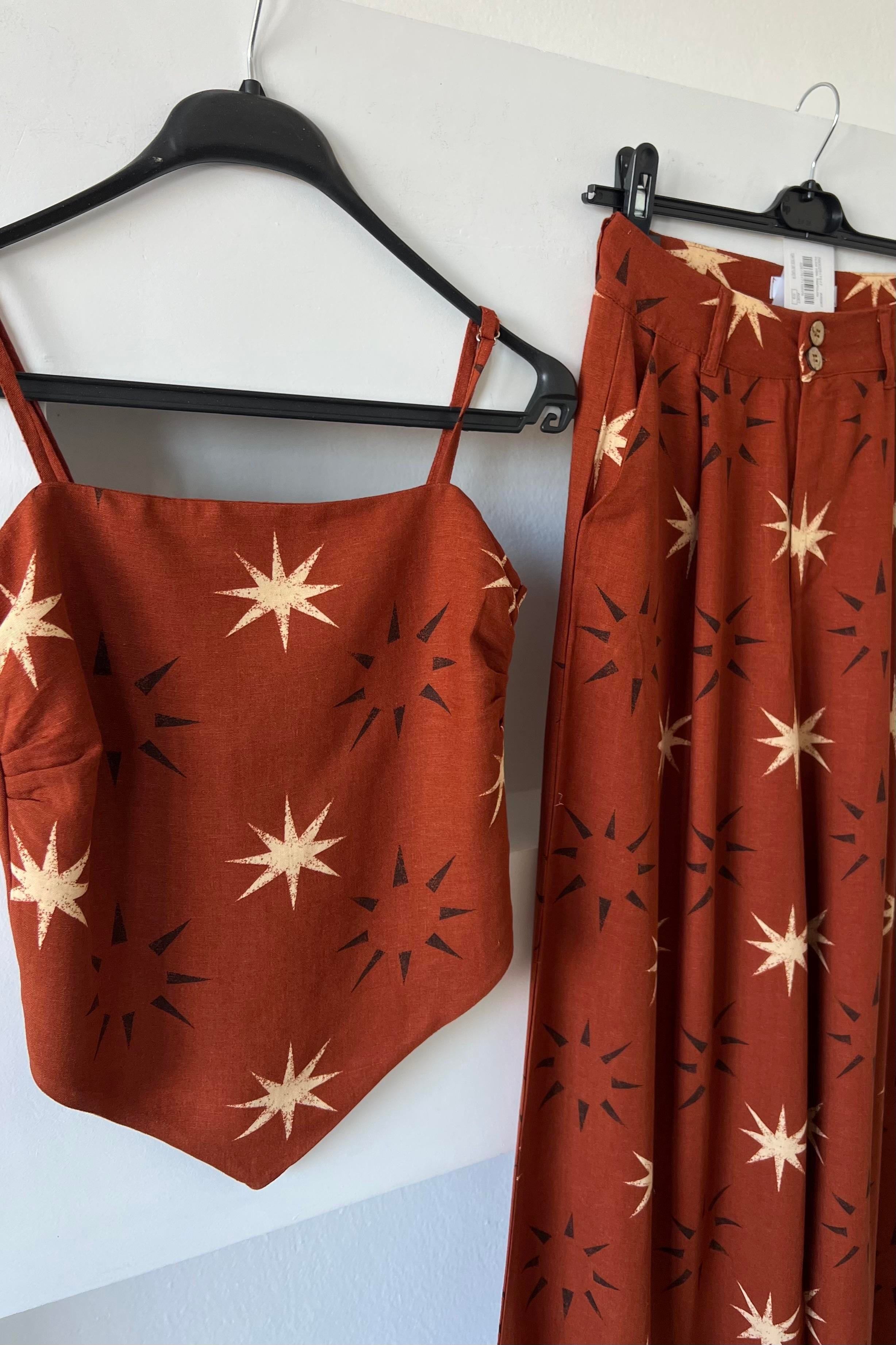 Yıldız Desenli Asimetrik Bluz ve Pantolon Takım uygun fiyatlarda www.butikhola.com adresinde