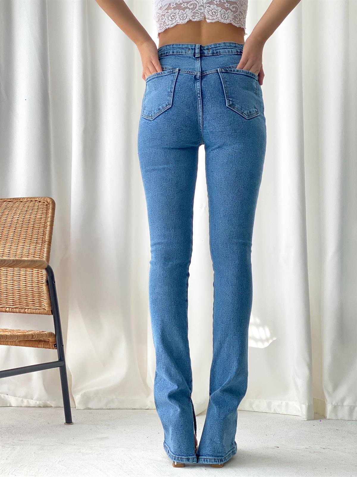  önü düğme ve fermuar detaylı yırtmaçlı likralı denim pantolon