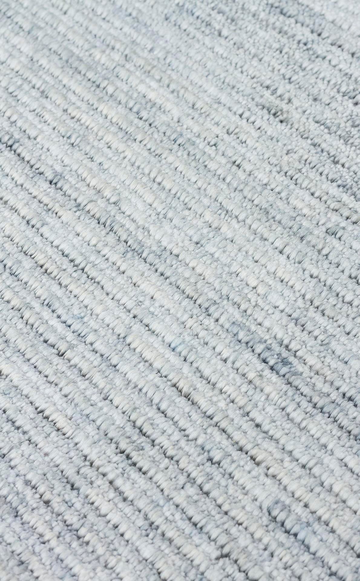 Çam Halı Gessi GES PLAIN SKY BLUE Özel Hav Vermeyen ve Kolay Temizlenebilir Tencel Kullanılarak El Emeği ile Özel Tezgahlarda Üretilen Modern Kara Tezgah Halısı