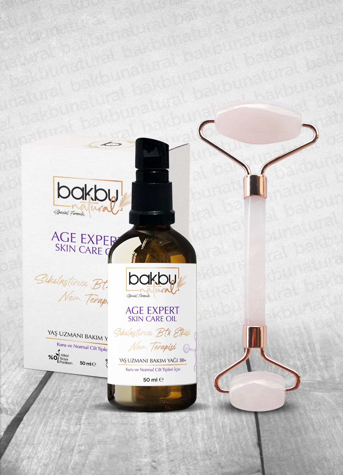 Bakbu Natural Yaş Uzmanı  Anti Aging Etkili Sıkılaştırıcı Yüz Ve Göz Çevresi Boyun Ve Dekolte Bölgesi Bakımında Etkili  Bakım Yağı Ve Pembe Kuvars Face Roller Masaj Taşı