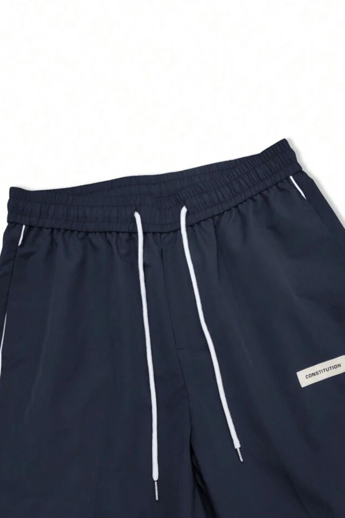 Lavcivert Paraşüt Kumaş Yarım Oversize Eşofman Altı - www.northlondon.com.tr