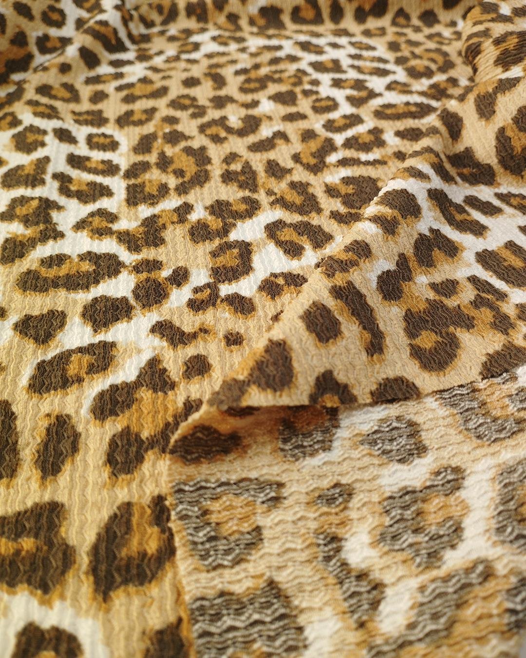 Kahve Tonları Ekru Leopar Desen Bürümcüklü Jarse En: 160 cm