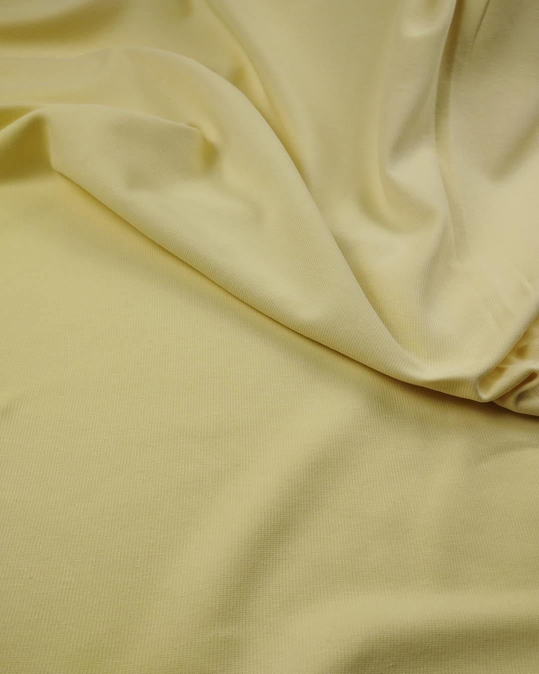 Pastel limon sarısı renkte dolgun tok interlok örmeEn: 150 cm