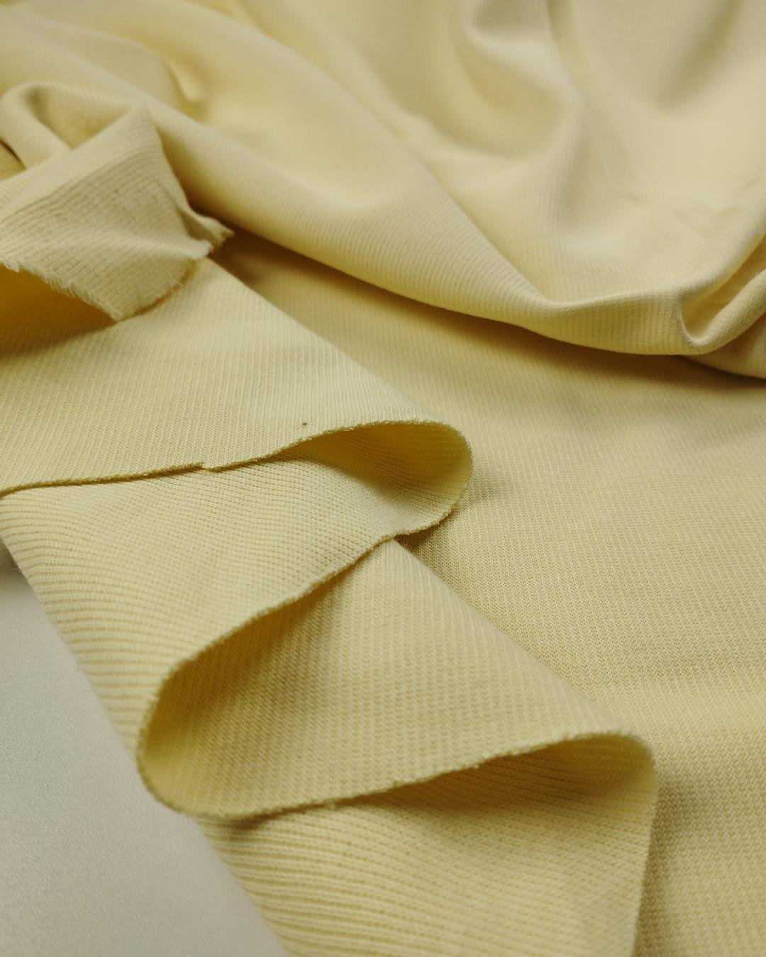 Pastel limon sarısı renkte dolgun tok interlok örme (En  150 cm x Boy  300 cm)