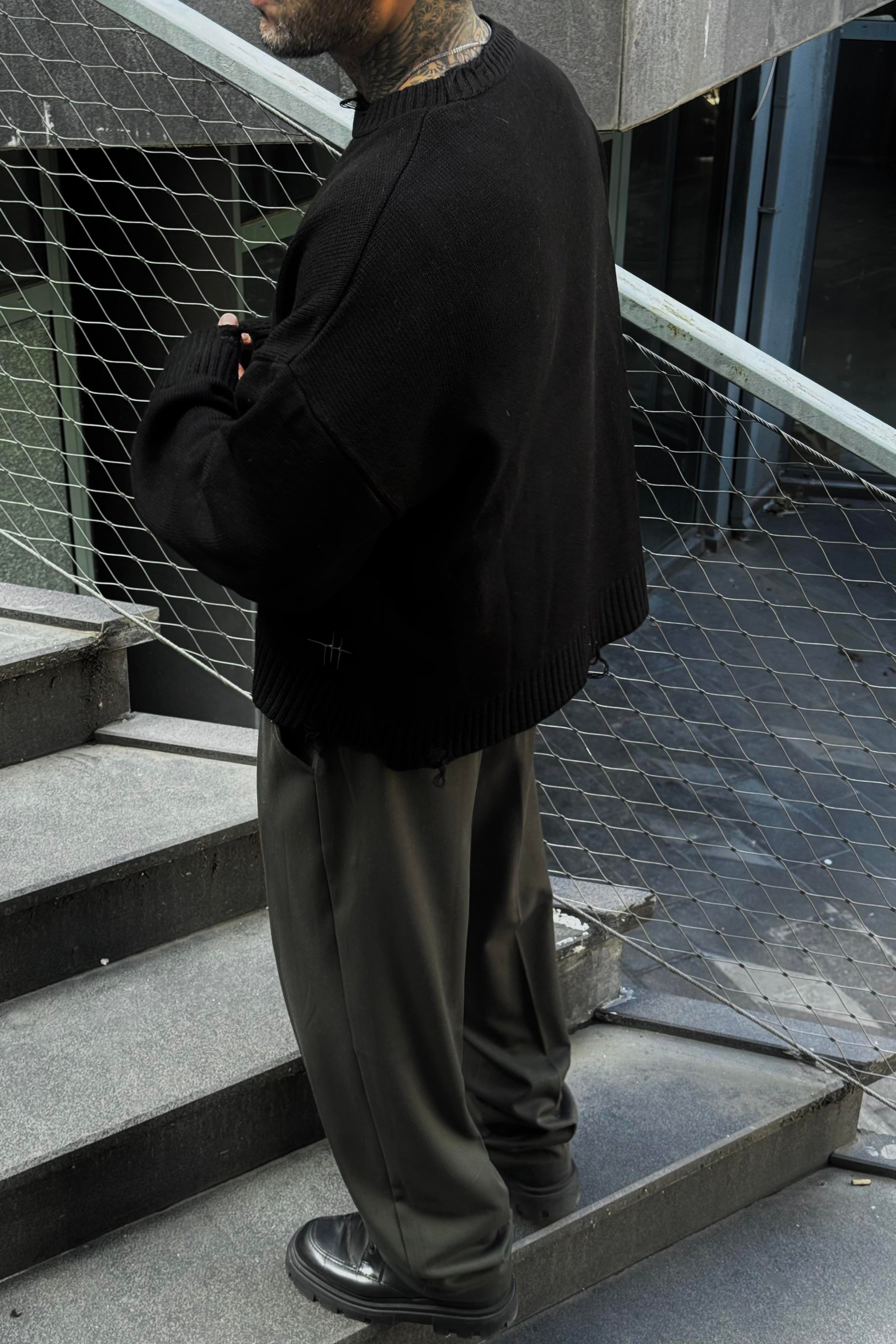 Distressed black oversize sweater 