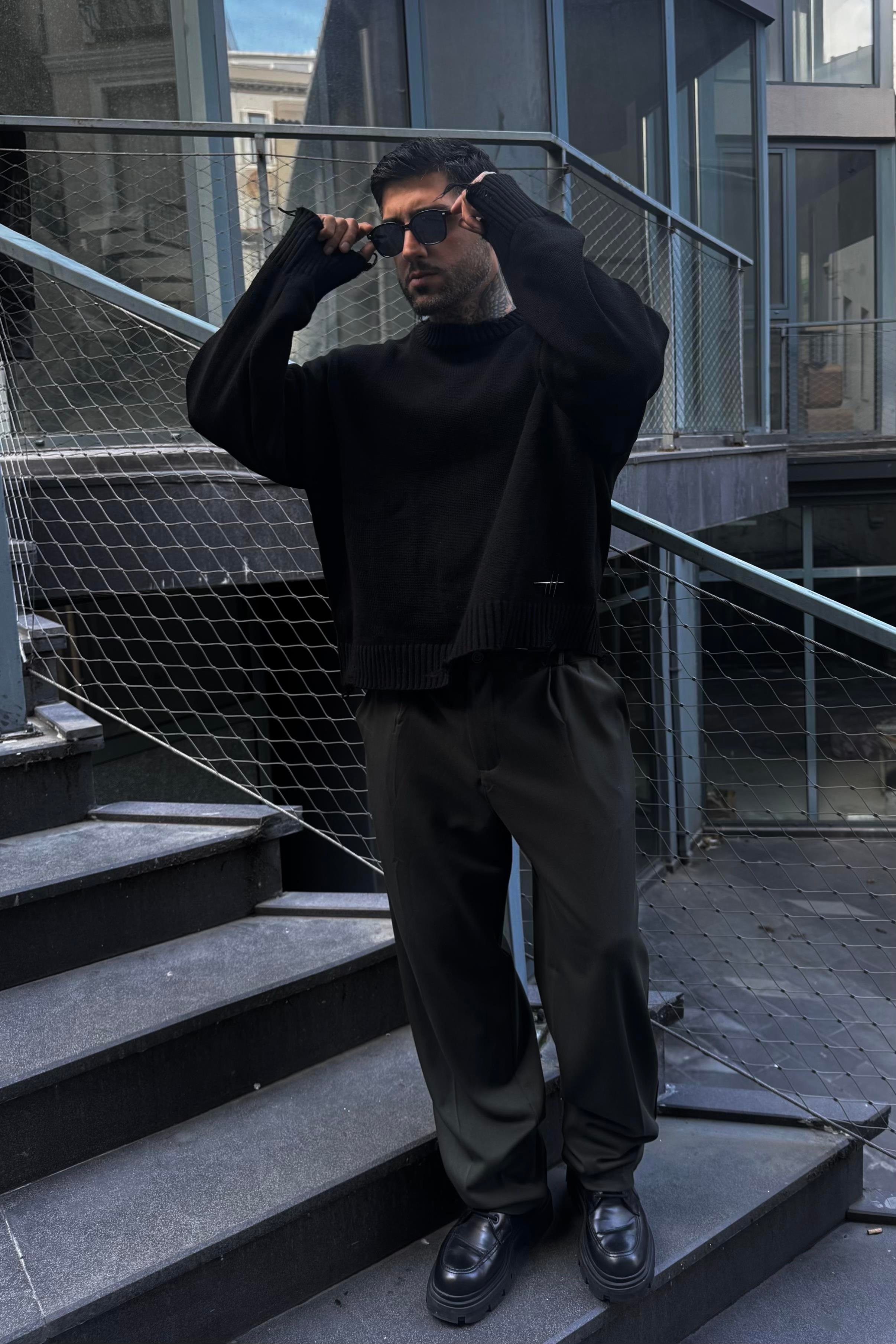 Distressed black oversize sweater 