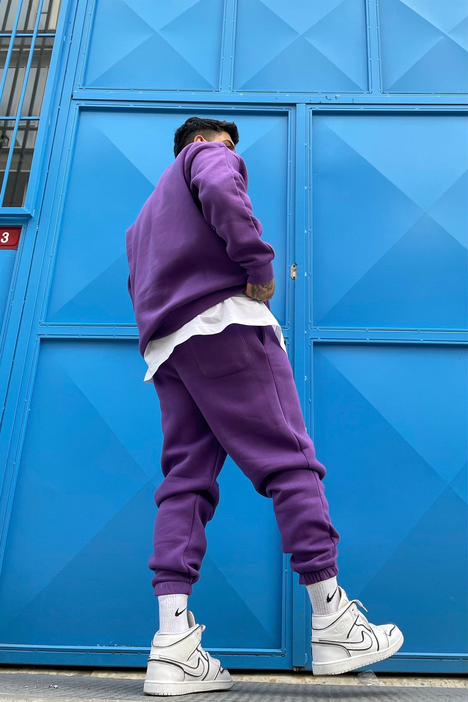 Purple track suit