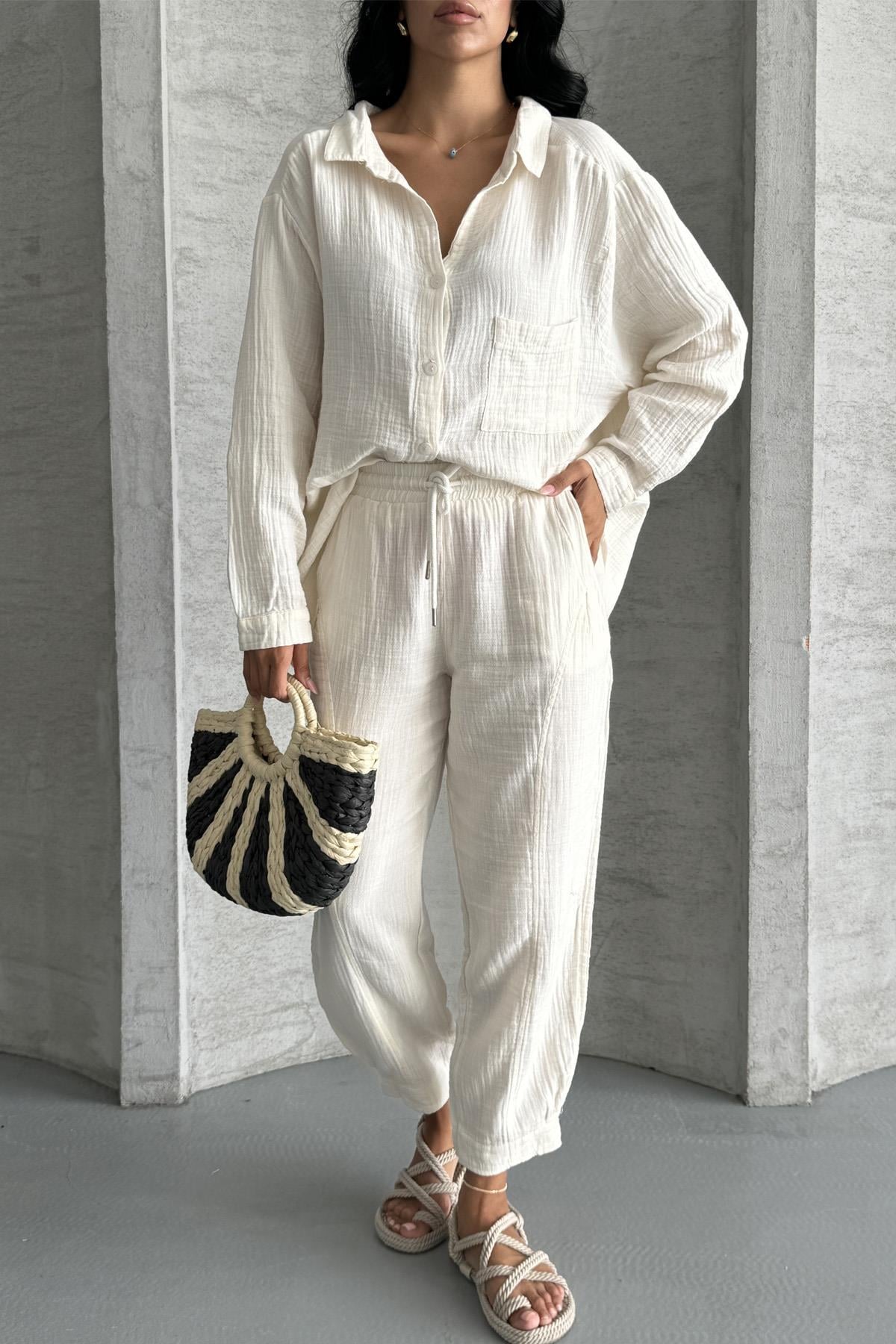 Coastal Muse Müslin Kumaş Oversize İkili TakımCoastal Muse Müslin Oversize Takım – Rahat ŞıklıkTAKIMİSTANGÜL BUTİK