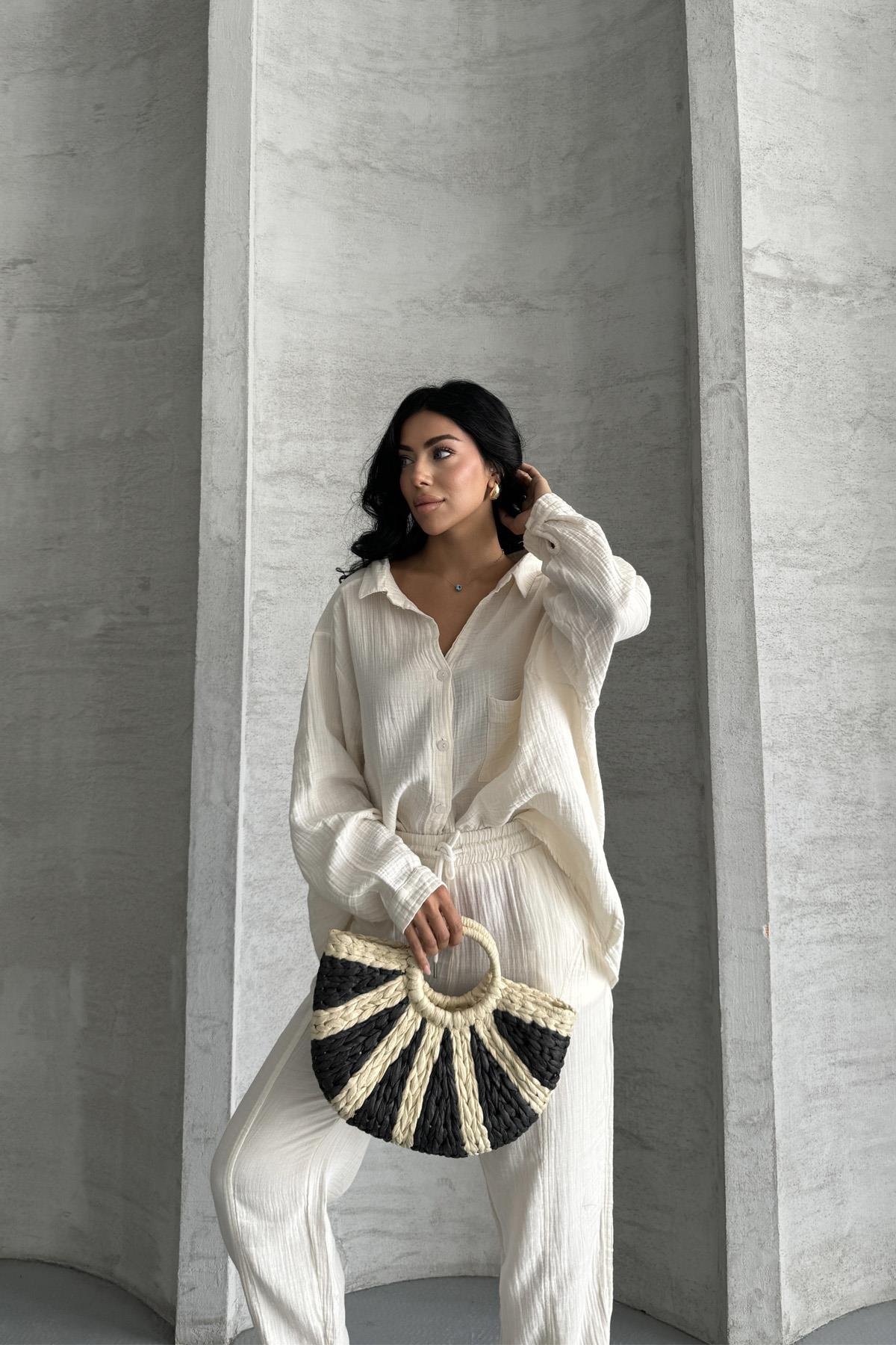 Coastal Muse Müslin Kumaş Oversize İkili TakımCoastal Muse Müslin Oversize Takım – Rahat ŞıklıkTAKIMİSTANGÜL BUTİK